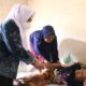 Wabup Gresik Aminatun Habibah pantau penyaluran bantuan sosial program keluarga harapan plus jaminan sosial lanjut usia (PKH plus Jaslut), di Desa Sirnoboyo Kecamatan Benjeng, Kamis (23/09/2021)./Foto: Bram