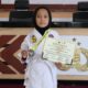 Divani Cantik Kusuma Wardani (8), siswi kelas 2 F MI Murni Sunan Drajad Lamongan berhasil meraih juara dua pada ajang National Karate Championship Virtual Kata Unesa Cup V, Minggu (21/11/2021). /Foto: Bram