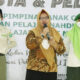 Wakil Bupati Gresik Aminatun Habibah saat melantik kader IPPNU Dan IPNU Kecamatan Driyorejo, Minggu (2/1/2022)./ Foto: Humas Pemkab
